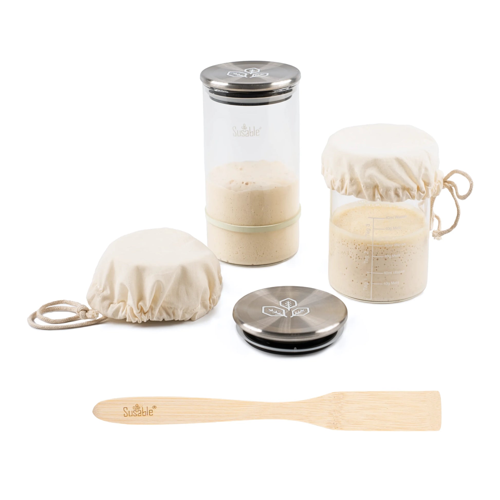 Das Susable Sauerteig Starter Set enthält Weithalsgläser mit Tages-Skala, um den Gärungsprozess deines Sauerteigs über drei Tage präzise zu verfolgen.